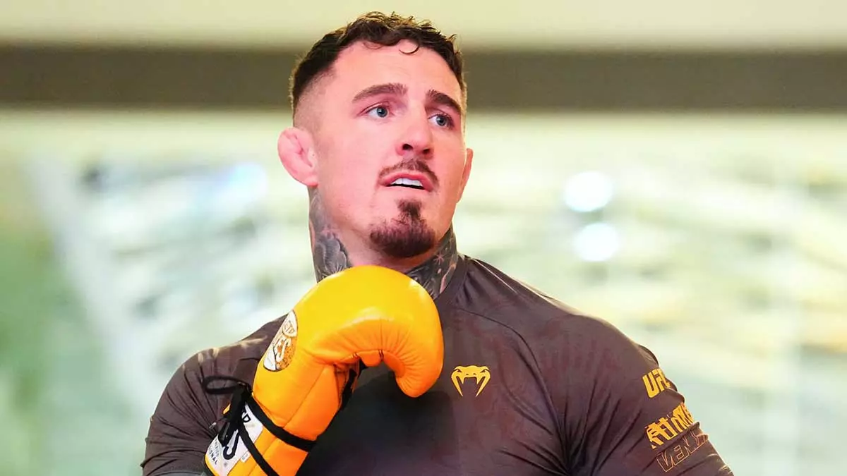 Том Аспиналл